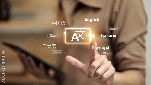 Photos Person Pointing at Translation Icon with Multiple Languages for Global Communica