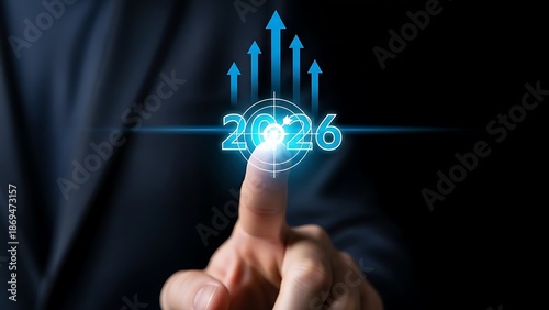Businessman's finger touches glowing 2026 projection, propelling future growth and stirring dynamic business strategies for accelerated success and ambitious goal achievement