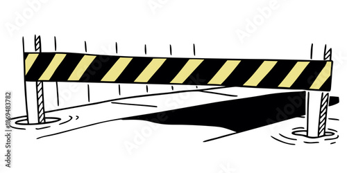 Construction barrier with black and yellow stripes on pavement  