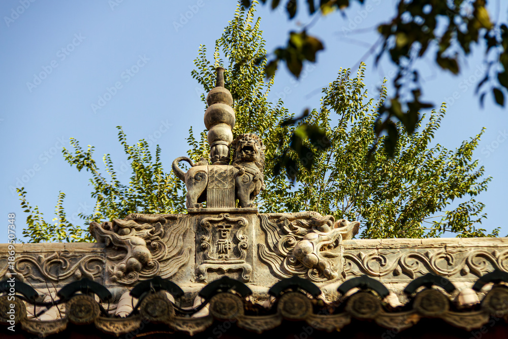Obraz premium Traditional Chinese Roof Detail and Ridge Ornaments at Kuqa Palace, Xinjiang