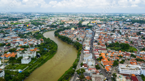 Calm river flowing through Tangerang City, Banten, Indonesia, highlighting a peaceful urban nature scene.