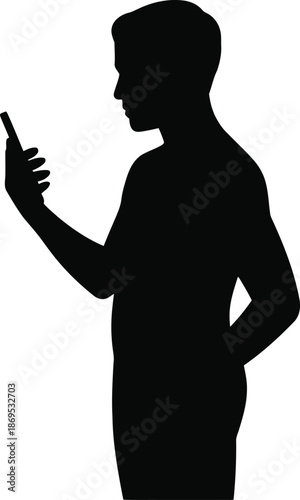 Silhouette of a man looking at a smartphone held in his hand, profile view male person
