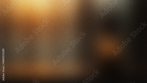 An abstract blurred background featuring warm tones of orange and brown with a gradient effect and indistinct shapes creating a soft atmosphere
