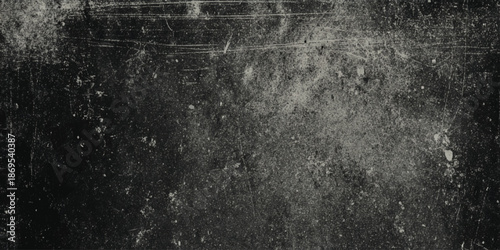 A heavily textured monochromatic abstract background featuring distressed surfaces and subtle light variations high quality professional