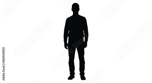 A full body view of a man standing in a dark silhouette