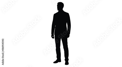 A full body image of a man in a suit dark and striking silhouette