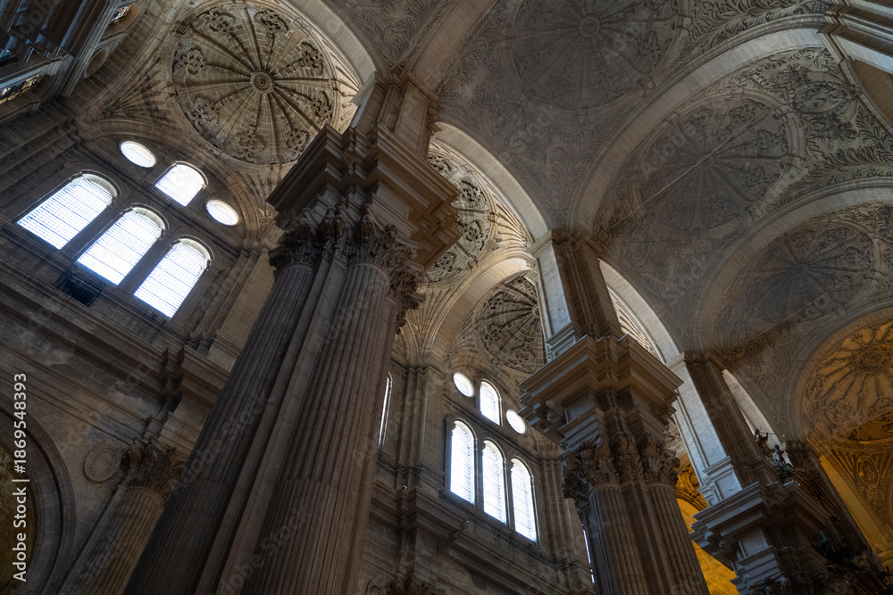 Obraz premium Interior view of a grand cathedral in Malaga.. Cathedral of Malaga, Spain