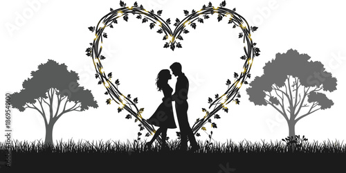 Silhouette of couple embracing under heart shaped vine arch