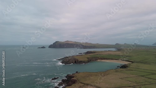 Scenic 4K aerial video of flying above spectacular Atlantic coastline, with picturesque rocks, cliffs and islands, Sybil head, Dingle Peninsula, Kerry, Ireland