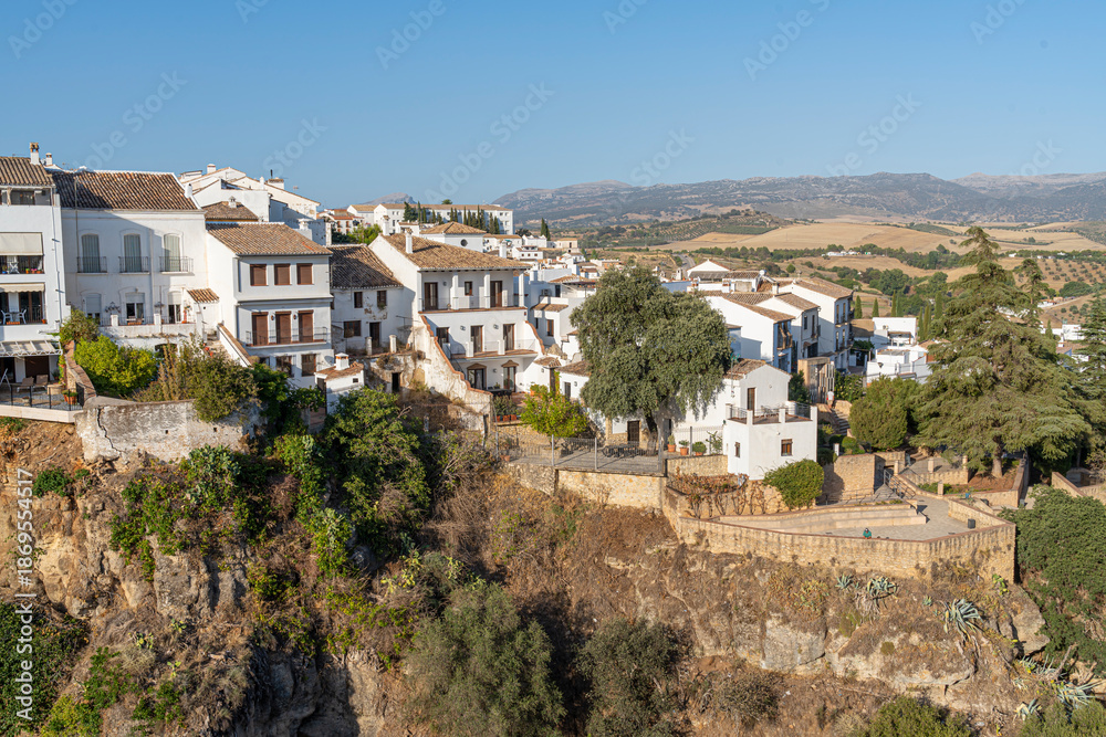 Fototapeta premium White buildings on a hillside in Ronda.. Ronda, Málaga, Spain