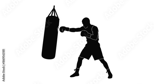 A boxer practicing a punch towards a hanging heavy bag silhouette