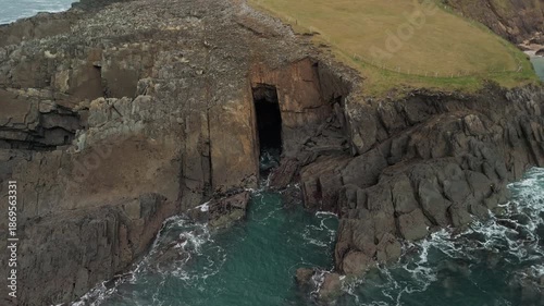 Scenic 4K aerial video of flying above spectacular Atlantic coastline, with picturesque rocks, cliffs and islands, Sybil head, Dingle Peninsula, Kerry, Ireland