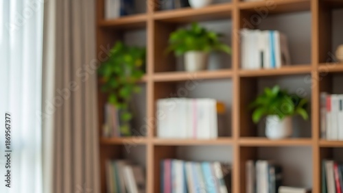 A blurred view of a cozy home library with books and potted plants on wooden shelves