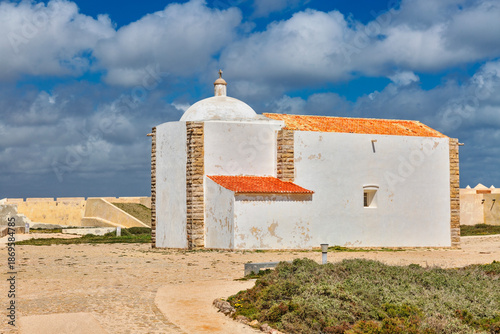 The historic Igreja de Nossa Senhora da Graça stands serenely on the windswept plateau of Cabo de São Vicente in Sagres, Portugal — Europe’s southwesternmost point.
