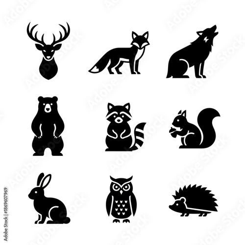 A set of black silhouettes featuring a collection of animal vector illustrations including cats, dogs, rabbits, and birds as domestic pet icons in a flat design mammal shape style