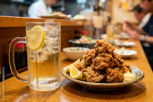 Steaming karaage fried chicken and icy highball on a wooden izakaya counter