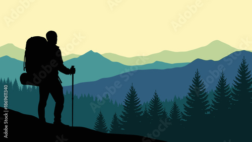 Silhouette of a hiker with a backpack standing on a hill.