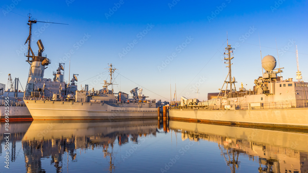 Fototapeta premium Late afternoon sunlight on the battleships of the marine museum in Wilhelmshaven, Germany