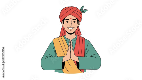 A smiling man wearing traditional attire with hands together in greeting