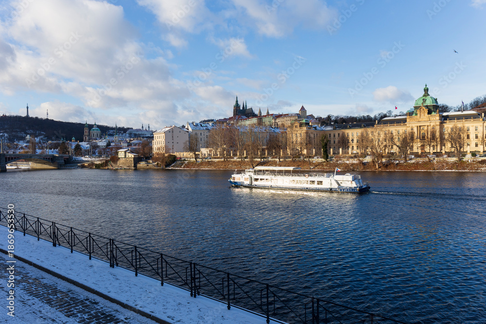 Obraz premium Snowy Prague Lesser Town with gothic Castle, Czech Republic 