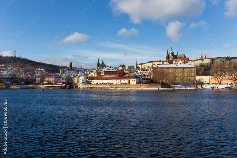 Obraz premium Snowy Prague Lesser Town with gothic Castle, Czech Republic 