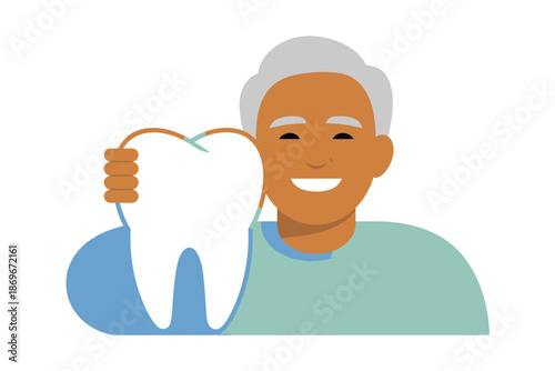 Smiling senior man happily holds a large white healthy tooth connected with.
