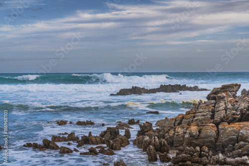 Meeting point of Atlantic and Indian Ocean in Cape Agulhas, South Africa. Garden Route