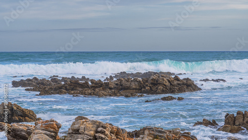Meeting point of Atlantic and Indian Ocean in Cape Agulhas, South Africa. Garden Route