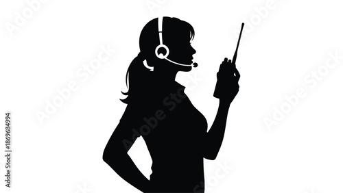 Silhouette of a woman with a headset and speaking into a microphone
