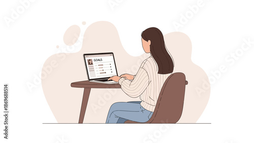 Woman working on laptop, setting goals and planning future achievements