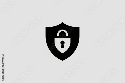 Black silhouette icon of a sturdy shield featuring a prominent padlock symbol indicating digital security and protection.