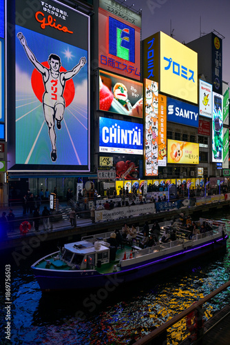 Glico running man and Night Reflections Along Dotonbori Canal, Osaka, Japan