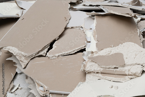 Heap of Broken Gypsum Boards and Drywall Scrap at Renovation Site
