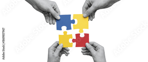 Four hands holding colorful jigsaw puzzle pieces connecting together, symbolizing teamwork and collaboration on a transparent background