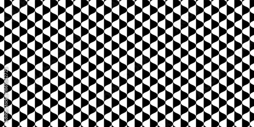 Geometric pattern of black triangles on a white background.Seamless in one direction.Option with an average fade out.The scale transformation method.