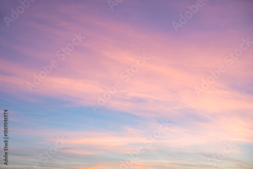 Bild auf Leinwand Pastel clouds in the evening sky. Pink and light purple.