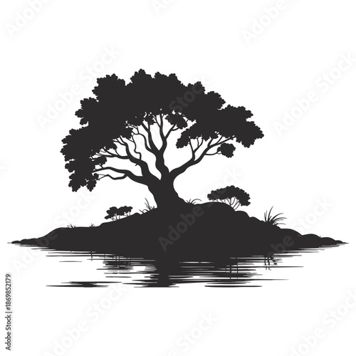 Silhouette of a solitary, mature tree on a small island in calm water with reflections.