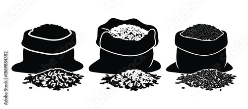 Different types of whole grain rice in three open burlap sacks and separate piles on the ground