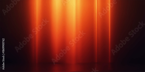 Warm orange light beams shining through a dark background