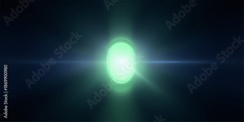 Bright green light shining in darkness with lens flare effect