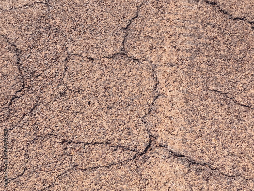 Fototapeta premium Cracked Asphalt Texture Background