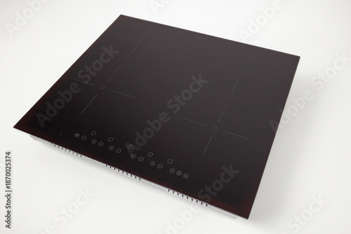 Fotografia Black induction cooktop creating modern kitchen cooking technology