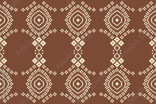 Traditional tribal ethnic pattern embroidery motif with brown color background geometric fabric pattern aztec cloth fashion.