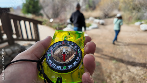 Fotografía Oak Glen, California, January 6, 2025: A Compass being used on the trail to find