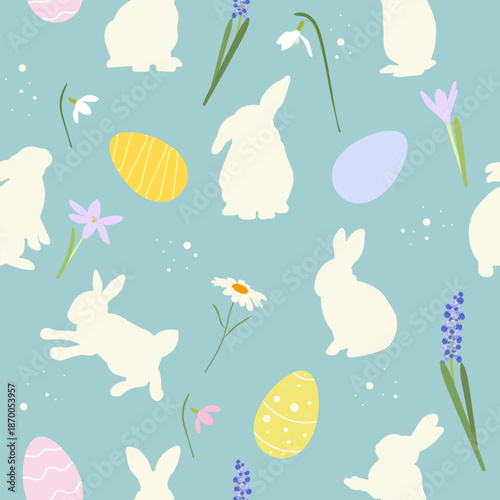 Seamless Easter vector pattern with cute bunny silhouettes, decorated eggs and spring flowers on pastel background. Perfect for wrapping paper, textiles, wallpapers, stationery and holiday designs.