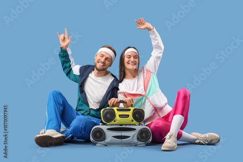 Young couple with boombox s...