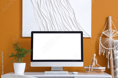 Workplace with blank comput...