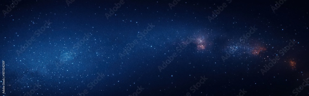 Fototapeta premium Vast starry night sky with countless stars and distant galaxy clusters glowing softly against deep blue space