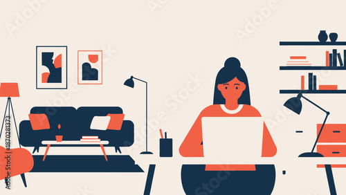 Young woman working remotely from home on her laptop.