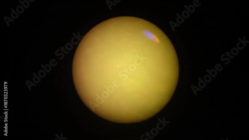 Celestial sphere glowing intensely with vibrant blue light against a deep black backdrop representing an abstract cosmic body or energy orb in dark space composition.